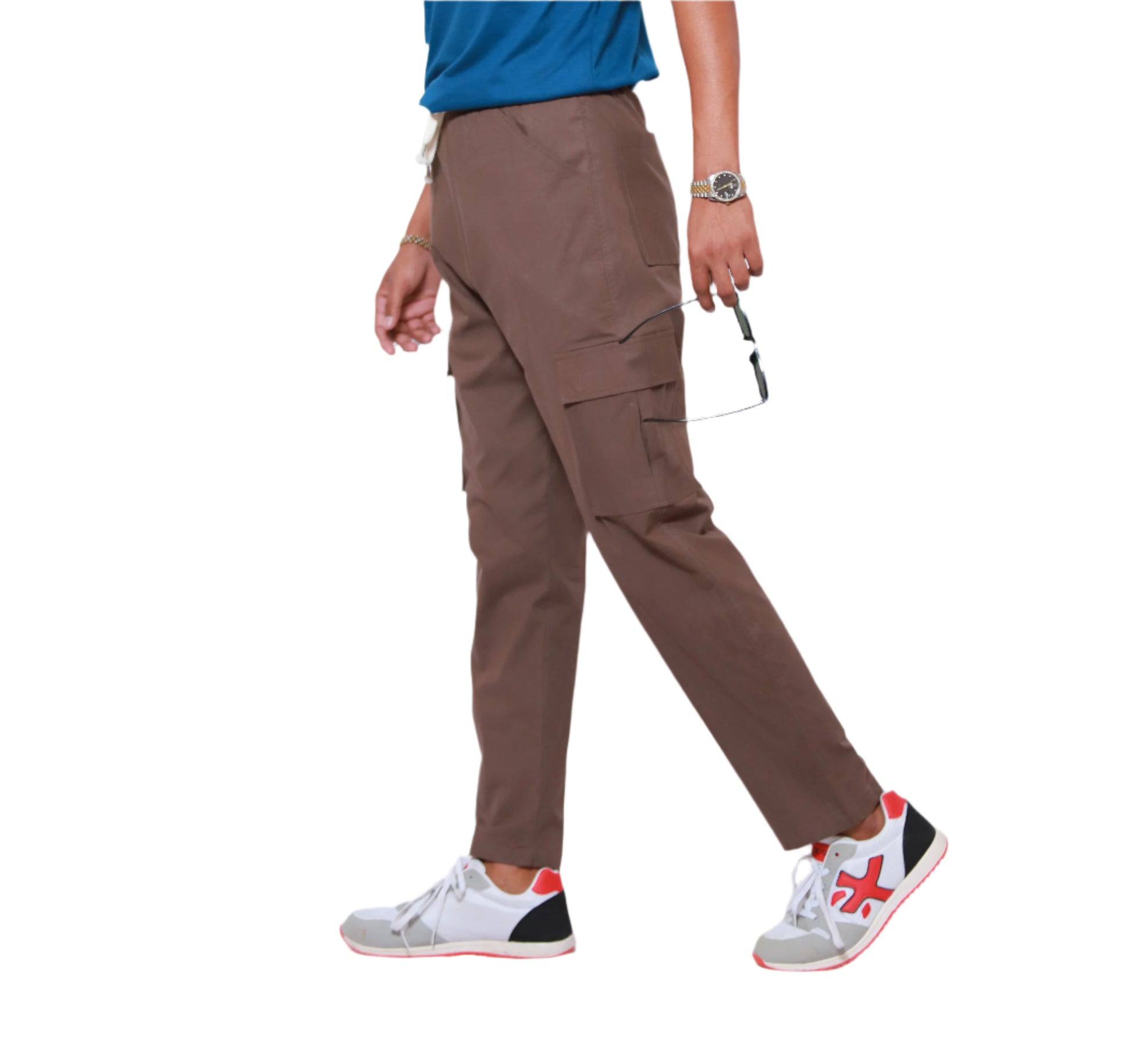 Person wearing brown 6-pocket-cargo-trousers, cargo pants with a white background
